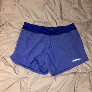 Women’s Brooks running shorts sz large built in Blue EUC
